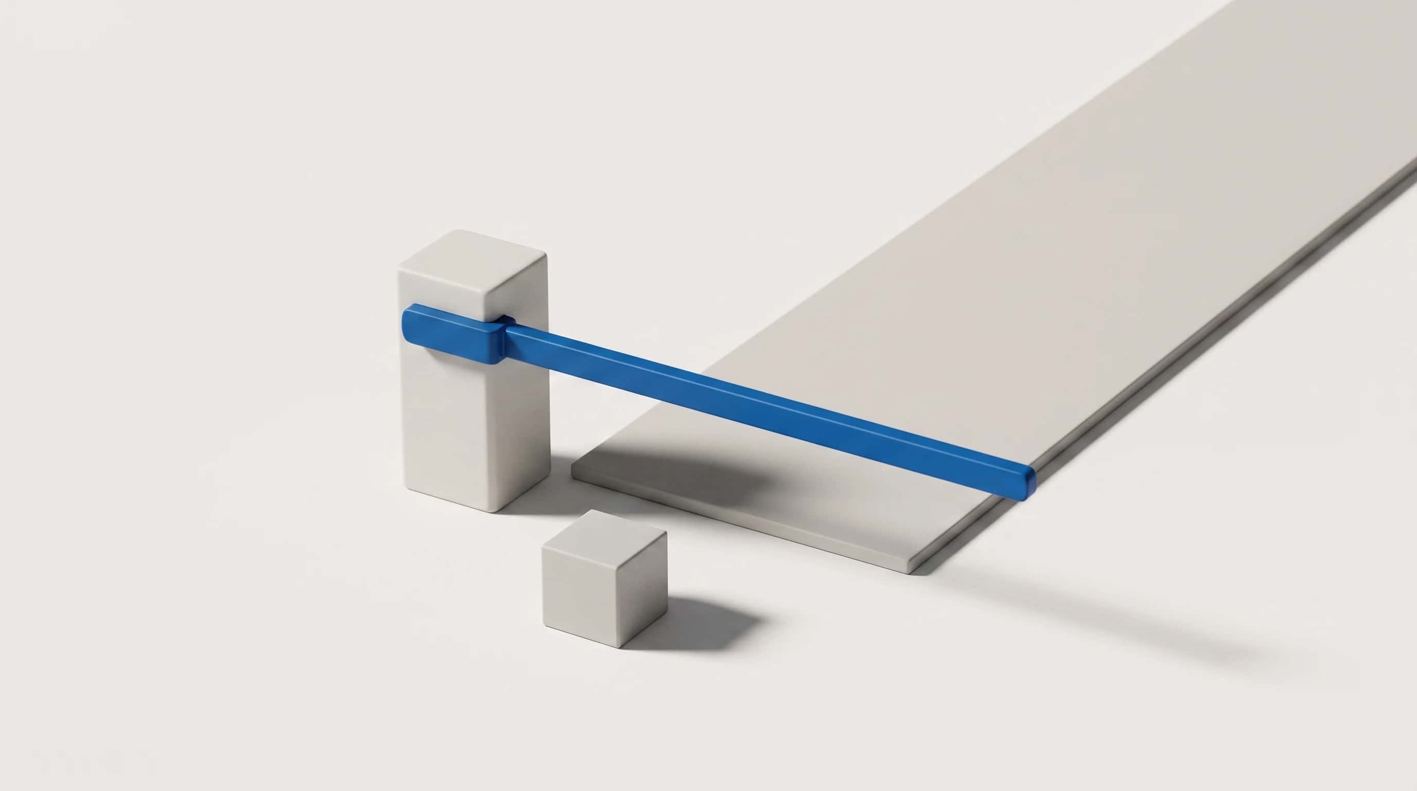 Miniatuur slagboom met een blauwe boom over een grijs pad, een klein blokje wacht ervoor