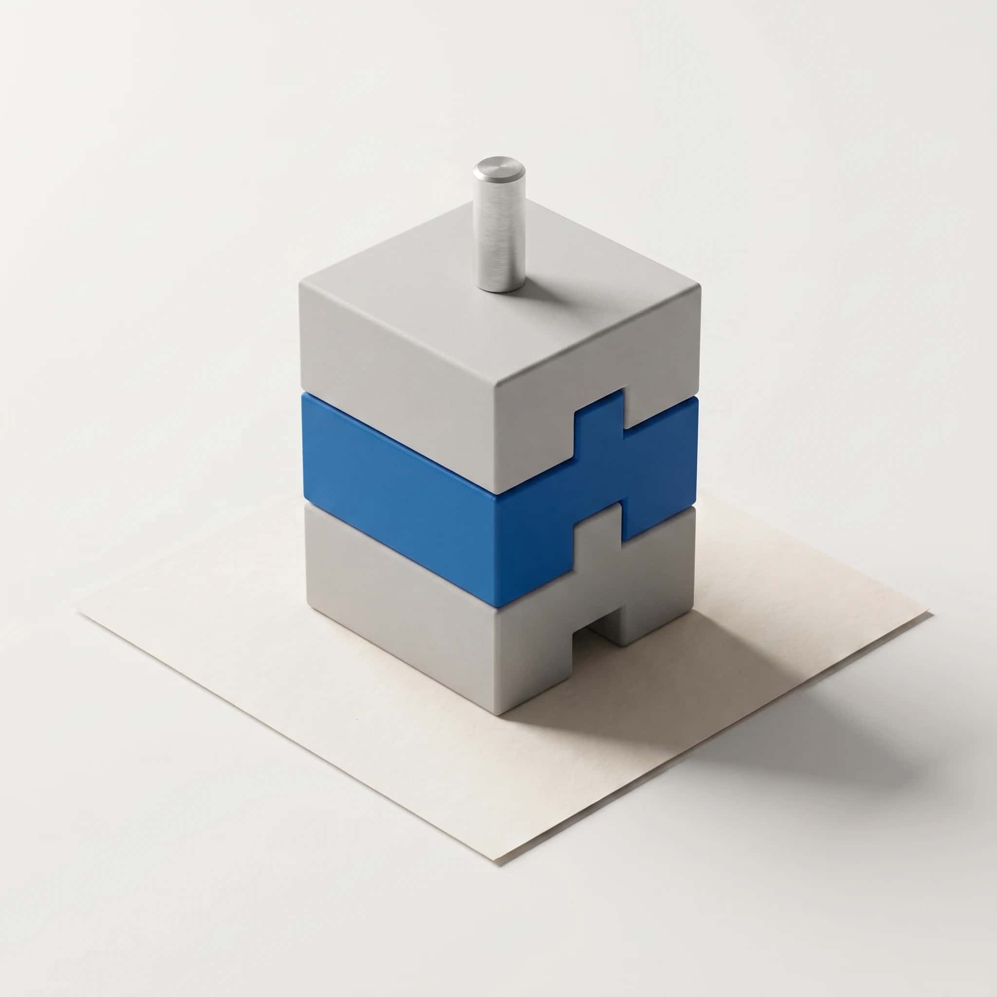 Render van drie gestapelde matte blokken die precies in elkaar passen, het middelste blauw